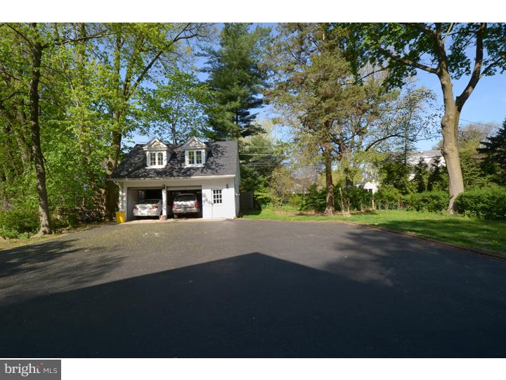 344 Penn Road Wynnewood, PA 19096 - Photo 21 of 25 a front view of a house with a yard