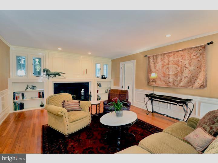 344 Penn Road Wynnewood, PA 19096 - Photo 4 of 25 a living room with furniture and a fireplace