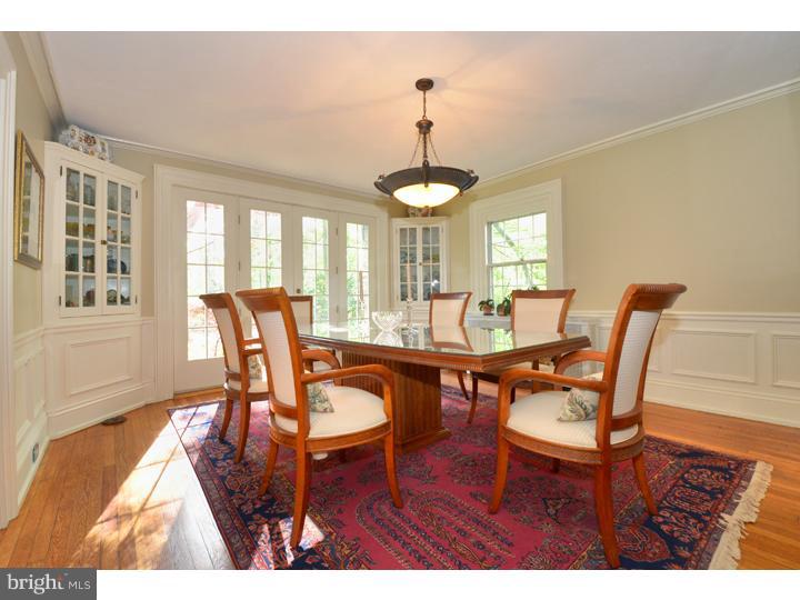 344 Penn Road Wynnewood, PA 19096 - Photo 6 of 25 a dining room with furniture a chandelier and wooden floor