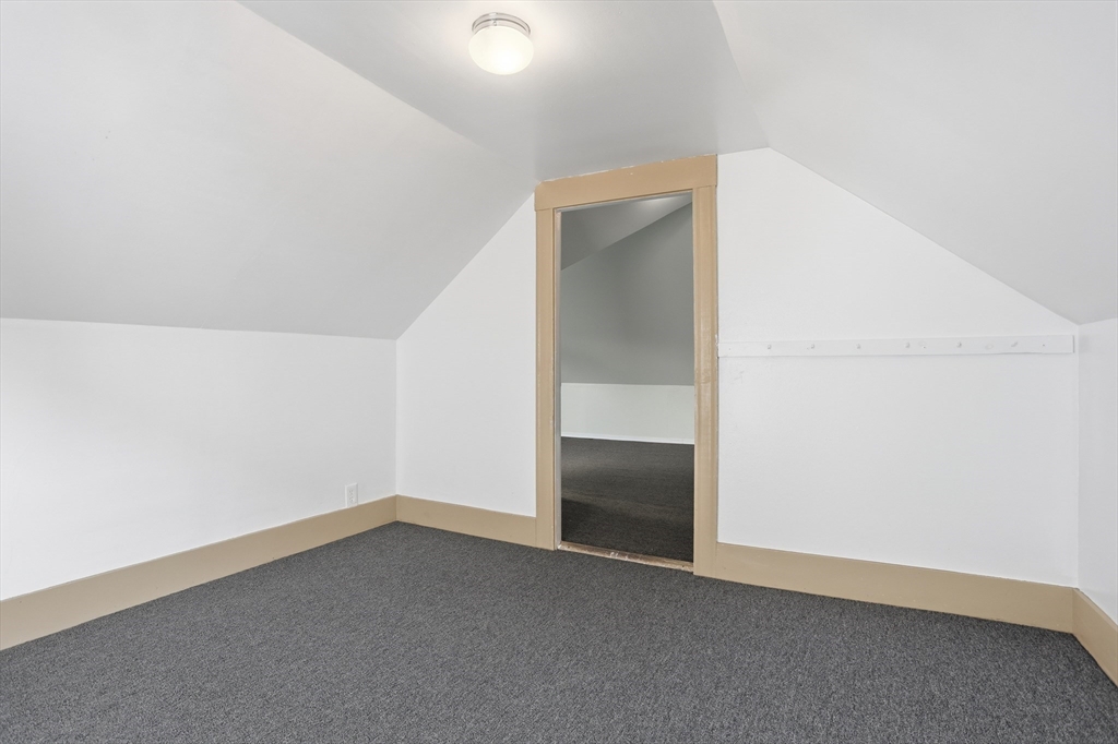 12 Whitcomb Street Webster, MA 01570 - Photo 30 of 40 an empty room with an entryway