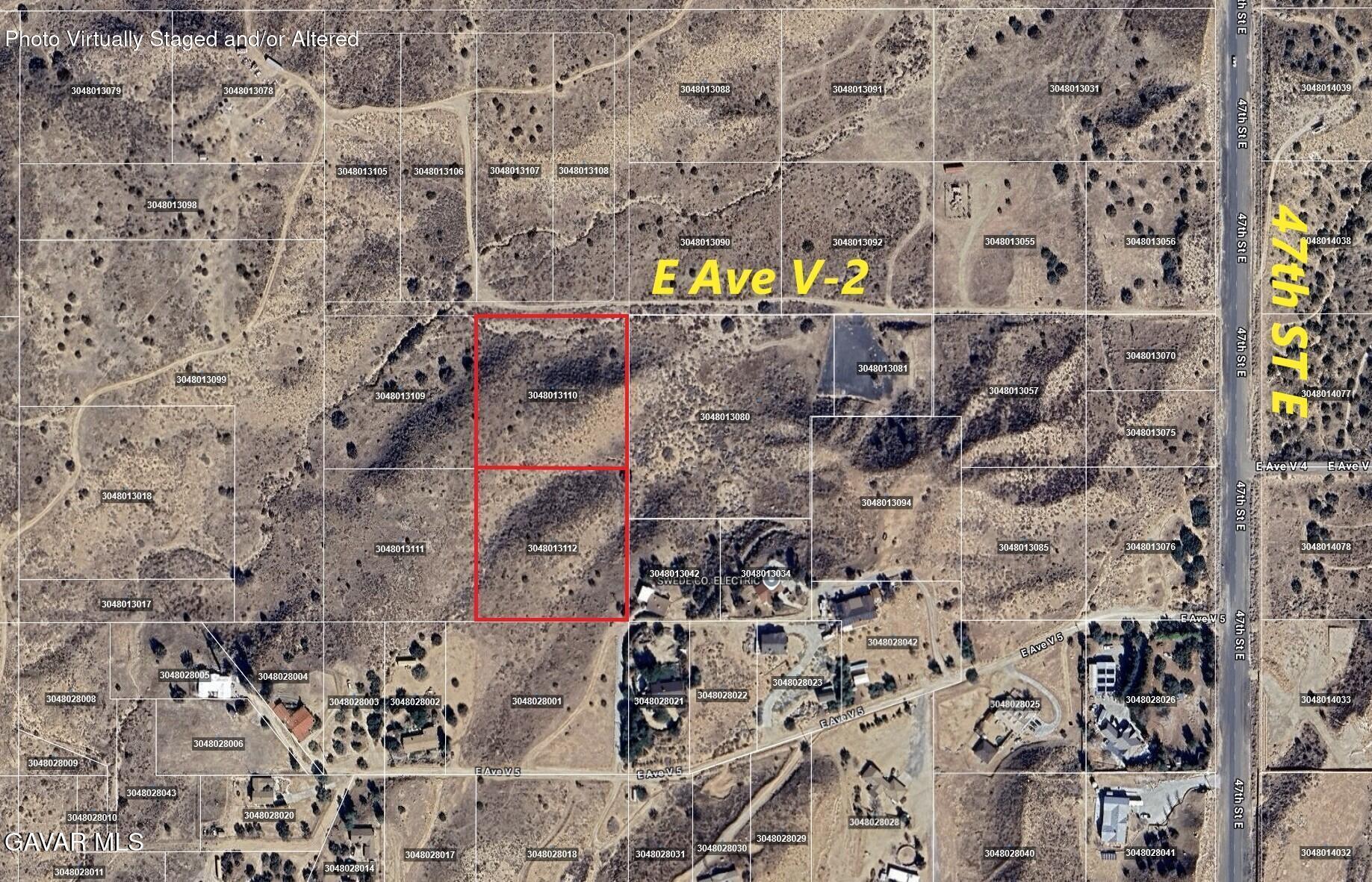 E Avenue Palmdale, CA 93552 - Photo 6 of 7 a street sign on a brick wall