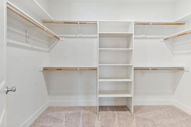 a view of an empty walk in closet