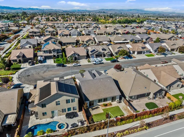 an aerial view of a city with lots of residential buildings