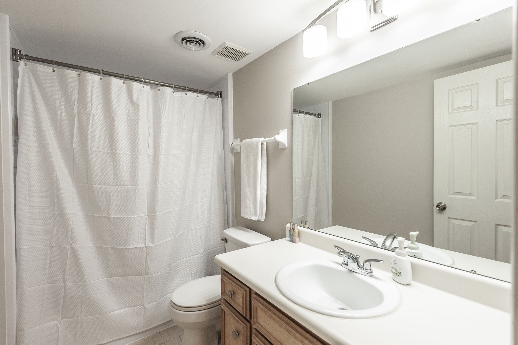205 Churchill Crossing Madison, TN 37115 - Photo 13 of 17 a bathroom with a sink toilet and shower
