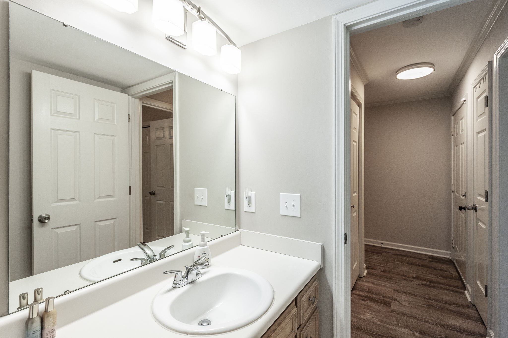 205 Churchill Crossing Madison, TN 37115 - Photo 14 of 17 a bathroom with a sink and a mirror