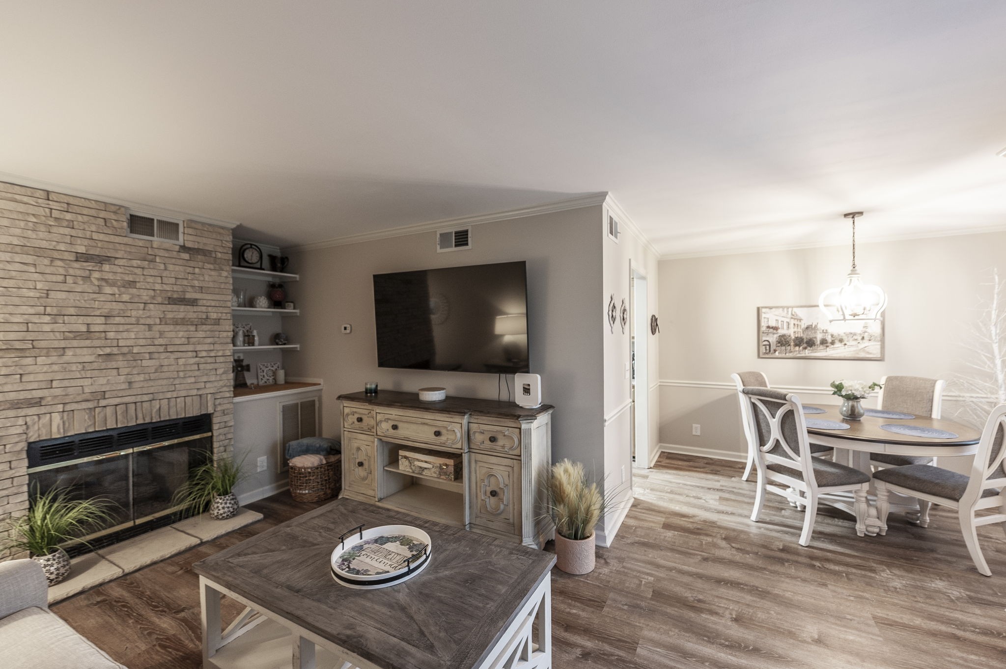 205 Churchill Crossing Madison, TN 37115 - Photo 10 of 17 a living room with furniture a flat screen tv and a fireplace