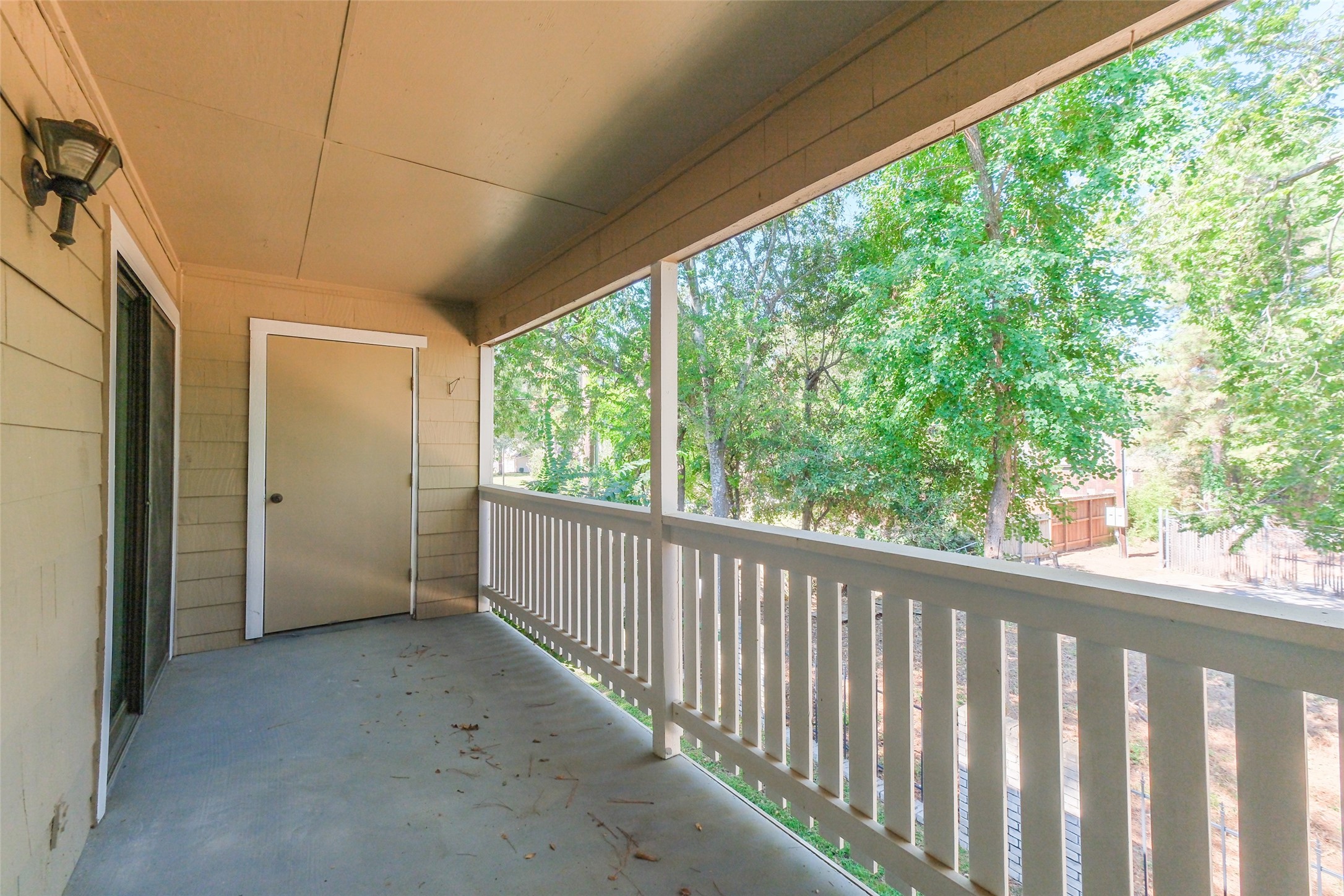 14911 Wunderlich Drive, Unit 2302 Houston, TX 77069 - Photo 23 of 33 This is the view of the balcony looking the other way - there is a storage closet too!