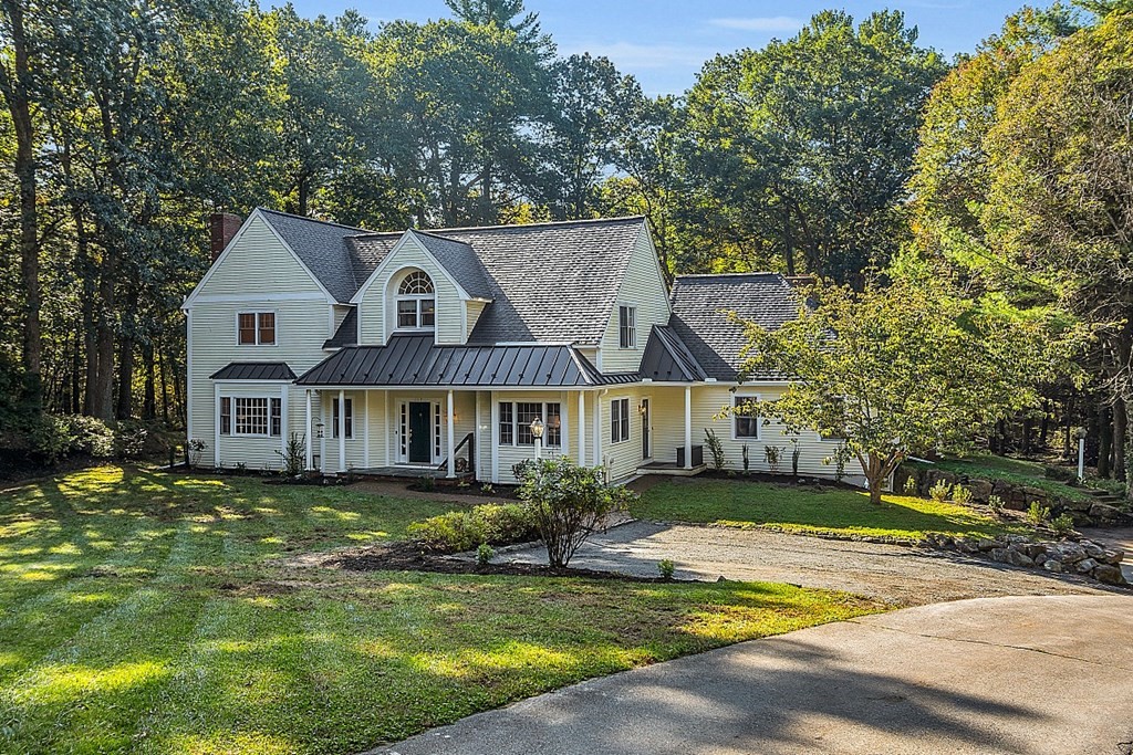 117 Channing Road Concord, MA 01742 - Photo 1 of 38 a view of a house with a big yard plants and large trees