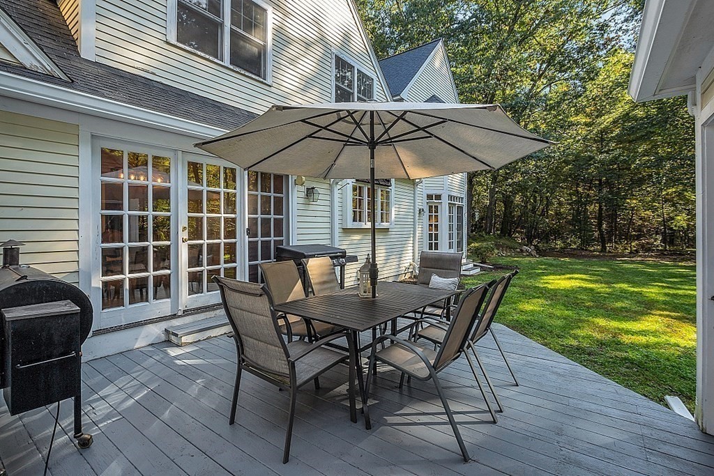 117 Channing Road Concord, MA 01742 - Photo 11 of 38 a view of a house with backyard and sitting area