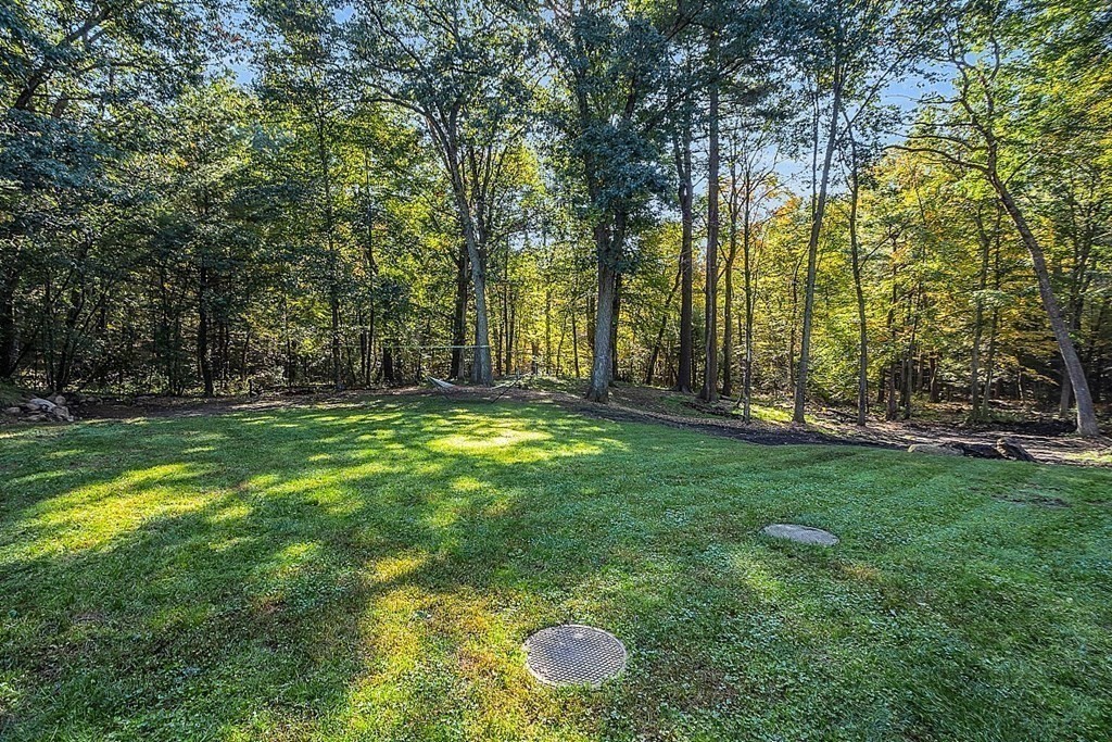 117 Channing Road Concord, MA 01742 - Photo 13 of 38 a view of outdoor space with deck and yard