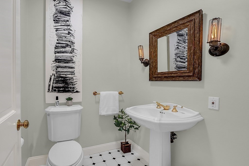 117 Channing Road Concord, MA 01742 - Photo 18 of 38 a bathroom with a sink toilet and mirror