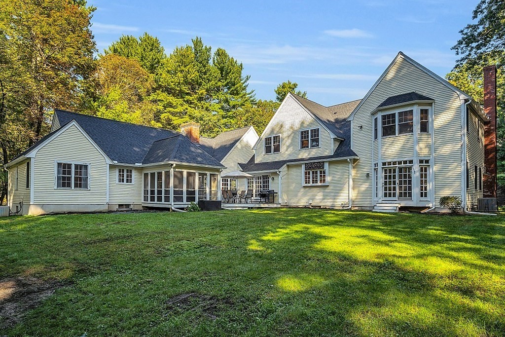 117 Channing Road Concord, MA 01742 - Photo 2 of 38 a front view of a house with a yard