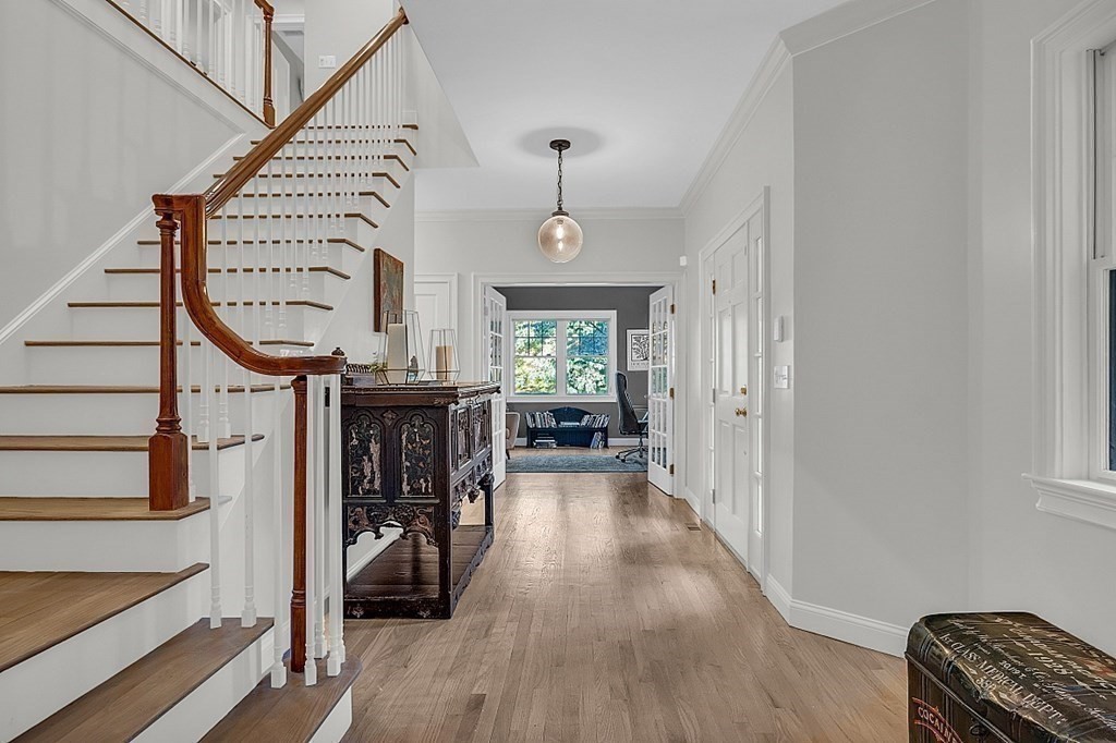 117 Channing Road Concord, MA 01742 - Photo 28 of 38 a view of entryway and hall with wooden floor