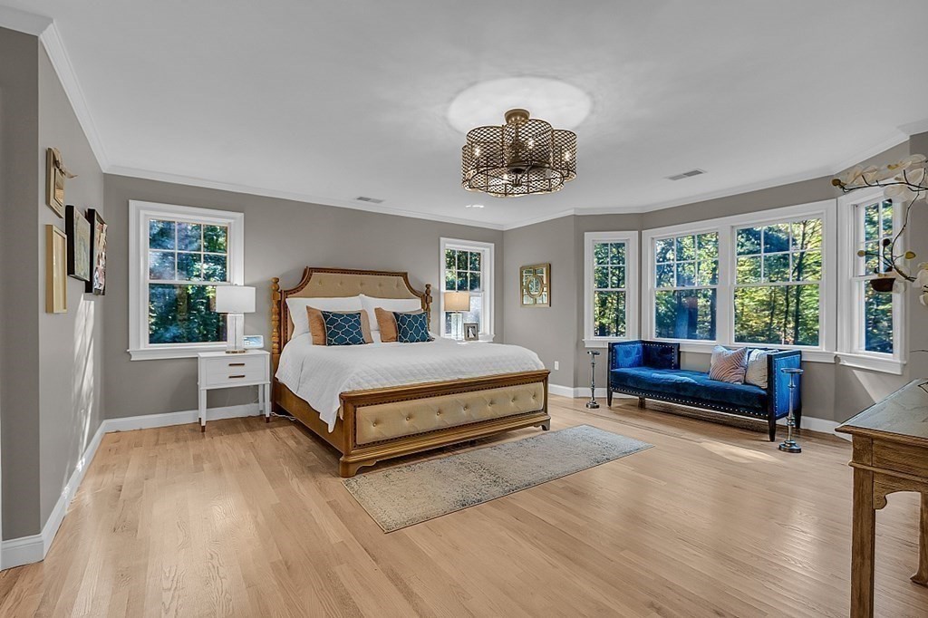 117 Channing Road Concord, MA 01742 - Photo 29 of 38 a bedroom with a large bed and a window