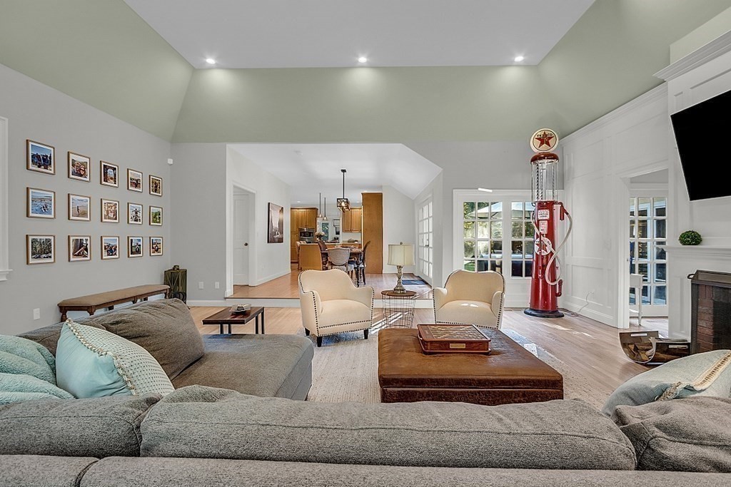 117 Channing Road Concord, MA 01742 - Photo 4 of 38 a living room with furniture and a flat screen tv