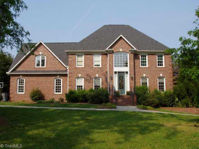 5933 Tarleton Drive Oak Ridge, NC 27310 - Photo 1 of 8 Exterior Front.