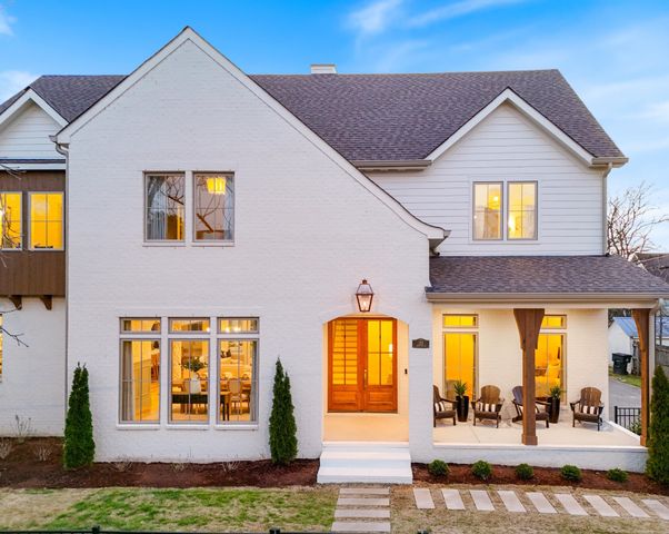 a front view of a house with a porch