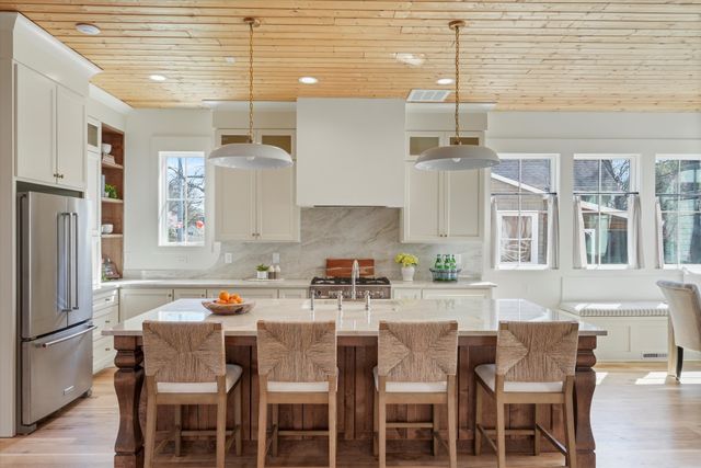 a en suite bathroom with a toilet sink and mirror