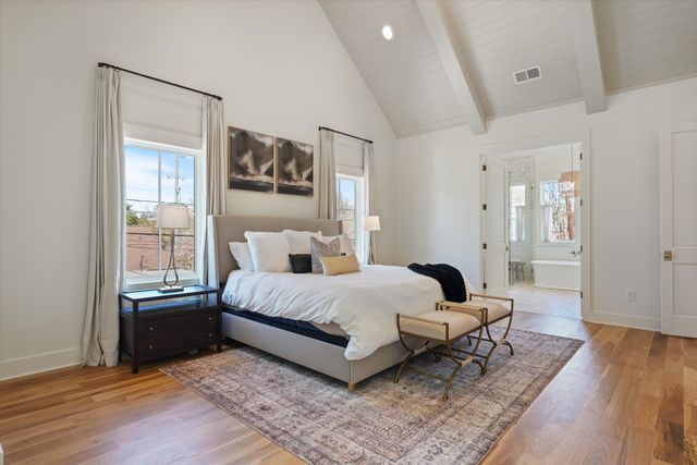 a room with a dresser and a mirror