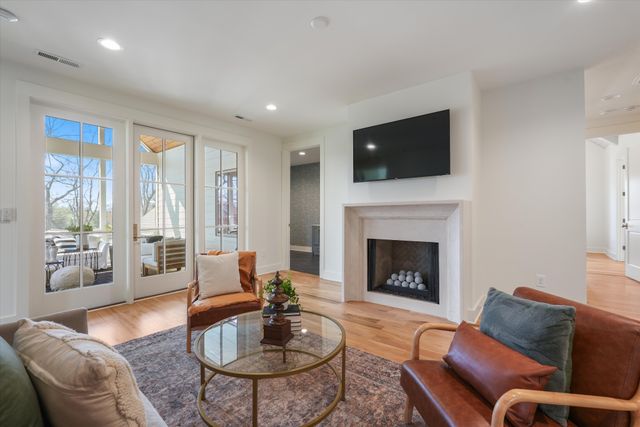 a view of swimming pool with a patio