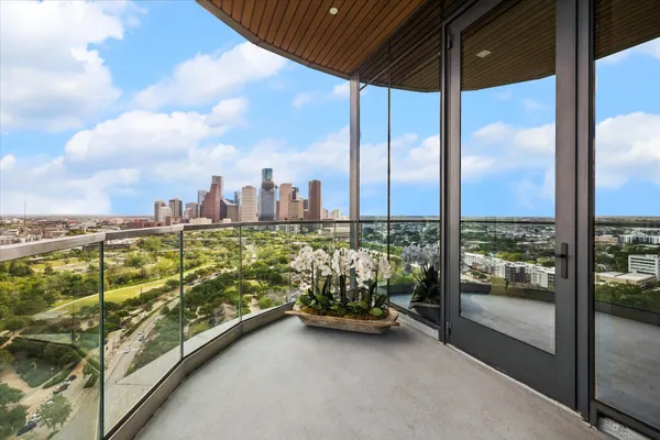 a view of a balcony with city view