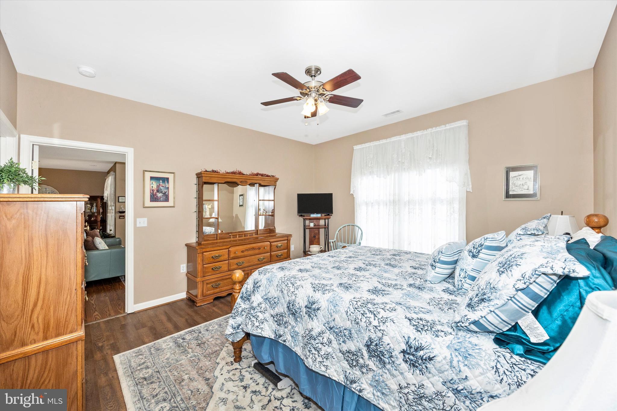 1005 Eastbourne Terrace Frederick, MD 21702 - Photo 20 of 39 a bedroom with a bed and a dresser with rug
