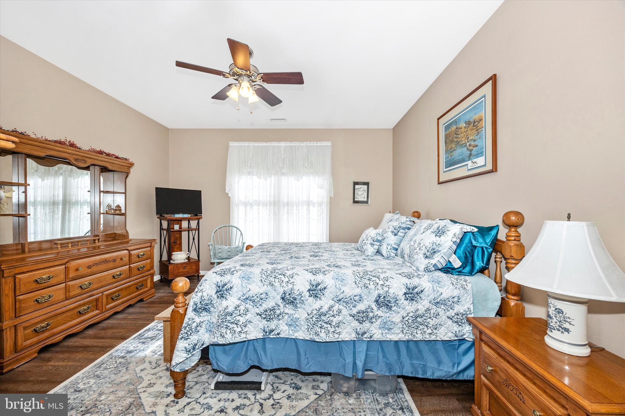 1005 Eastbourne Terrace Frederick, MD 21702 - Photo 22 of 39 a bedroom with a large bed and a chandelier