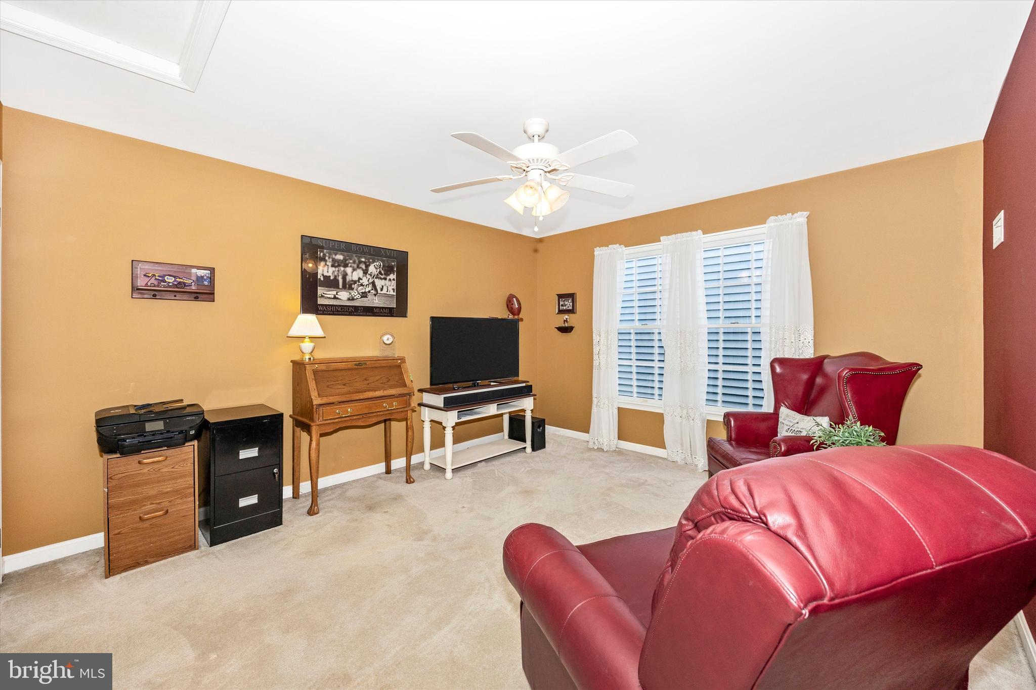 1005 Eastbourne Terrace Frederick, MD 21702 - Photo 29 of 39 a bedroom with a bed and a flat screen tv