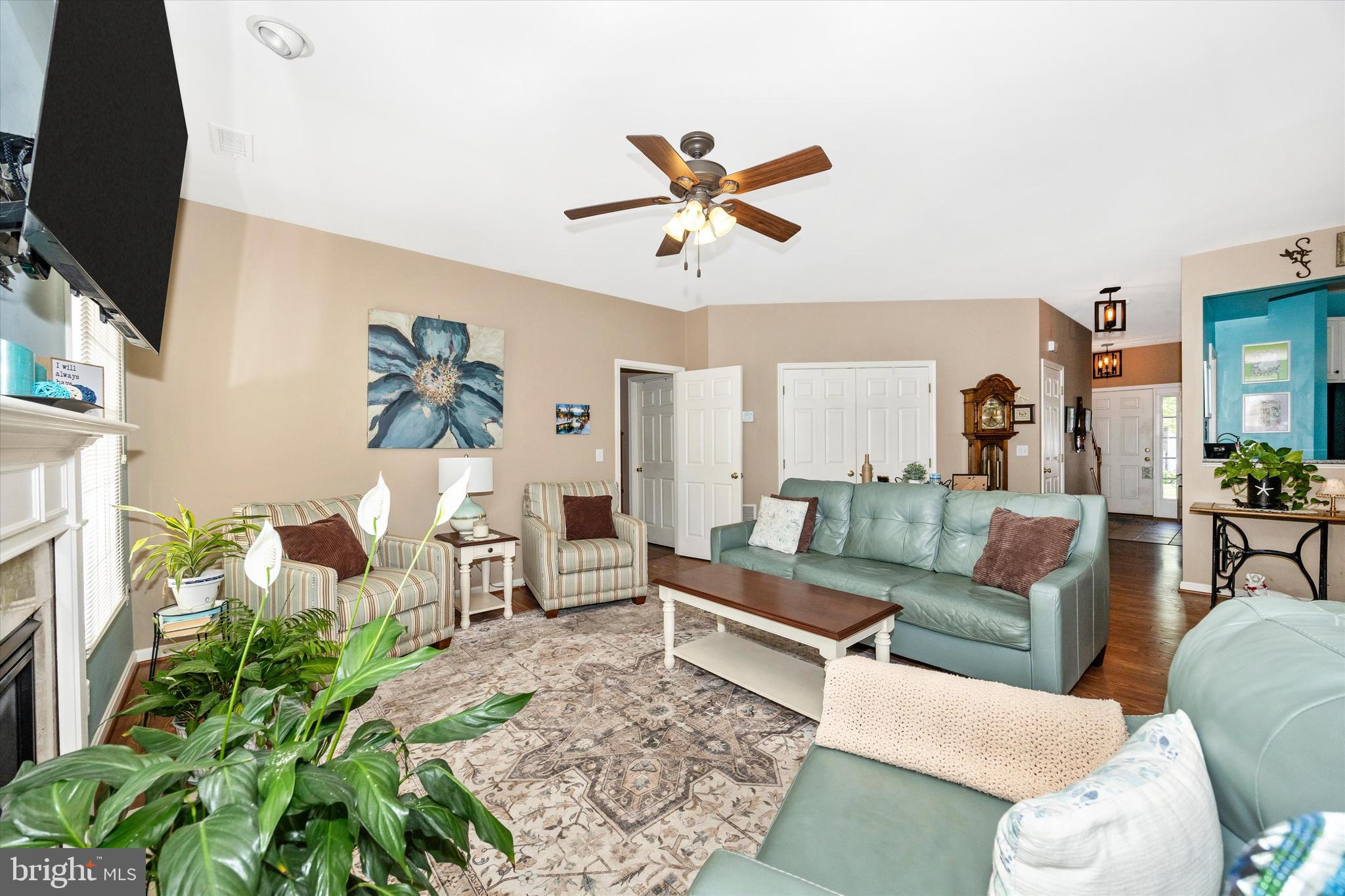 1005 Eastbourne Terrace Frederick, MD 21702 - Photo 6 of 39 a living room with furniture and a flat screen tv
