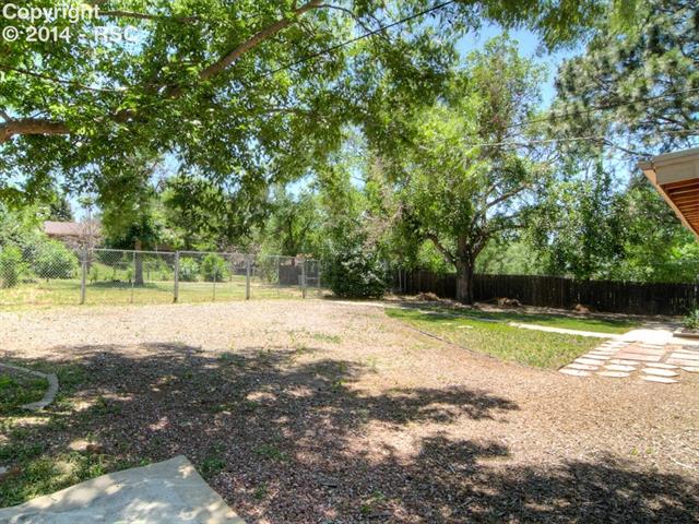 3827 Panorama Road Colorado Springs, CO 80907 - Photo 16 of 16 Oversized fully fenced in back yard with RV parking and alley access