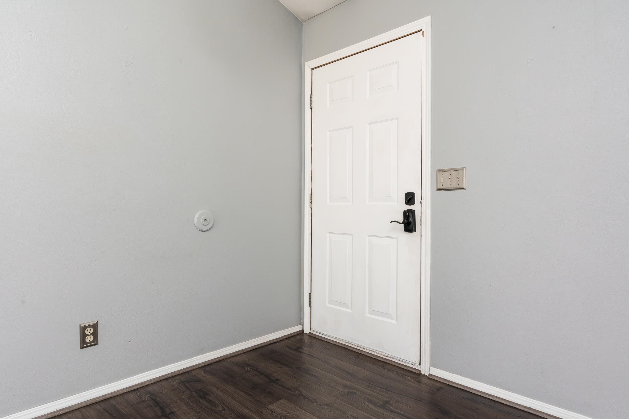 1996 Broadmoor Road Rockton, IL 61072 - Photo 12 of 45 an empty room with wooden floor and closet