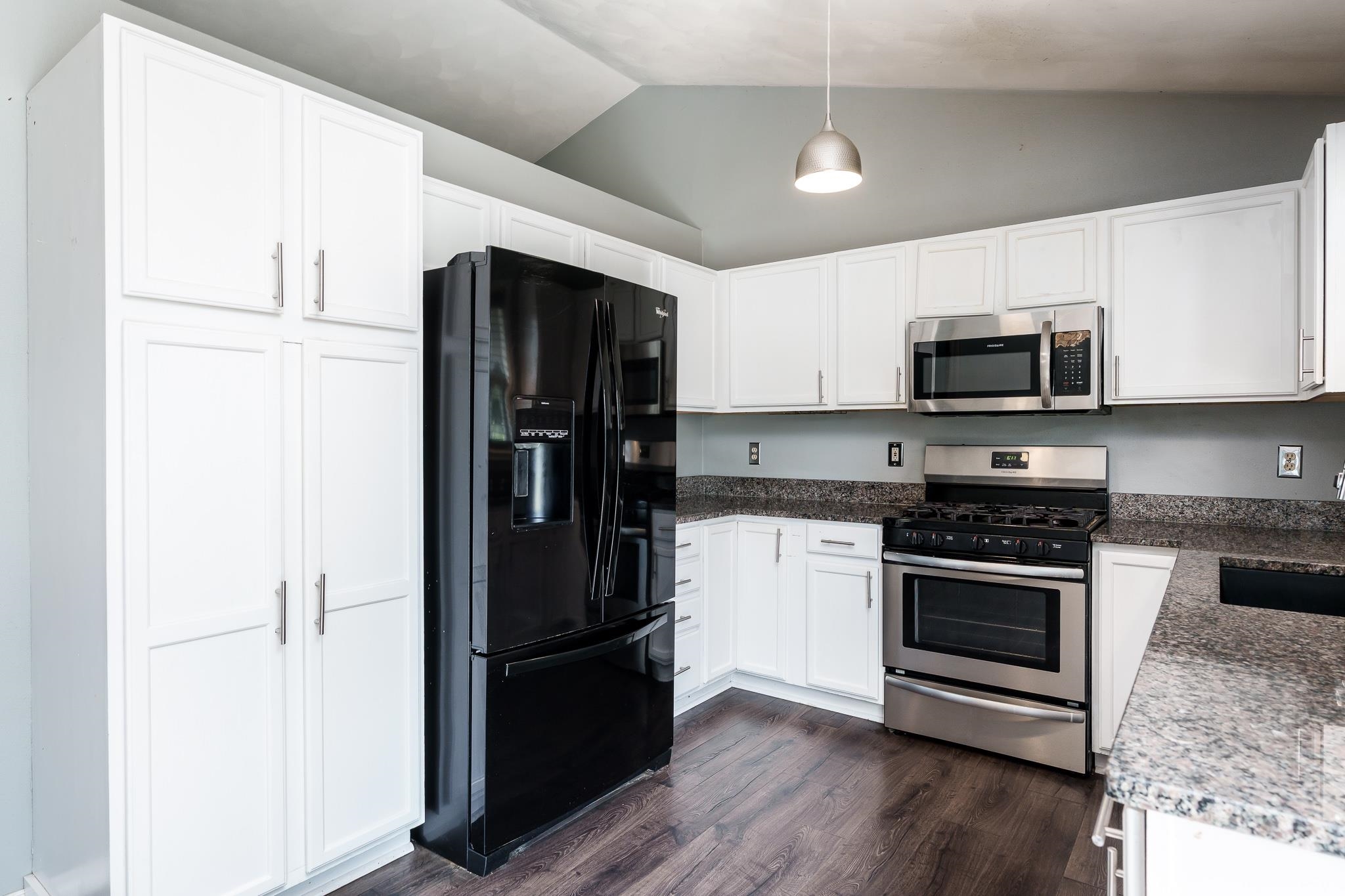 1996 Broadmoor Road Rockton, IL 61072 - Photo 19 of 45 a kitchen with a refrigerator stove and microwave