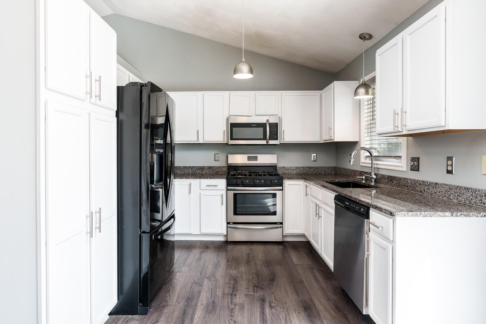 1996 Broadmoor Road Rockton, IL 61072 - Photo 20 of 45 a kitchen with stainless steel appliances a refrigerator sink and cabinets