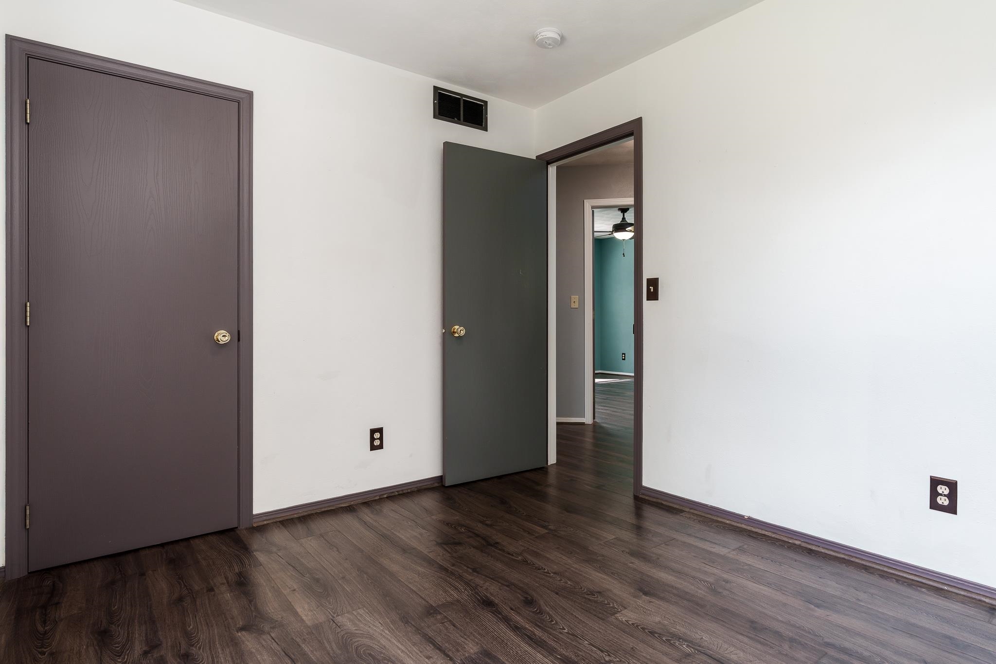 1996 Broadmoor Road Rockton, IL 61072 - Photo 31 of 45 an empty room with wooden floor and closet