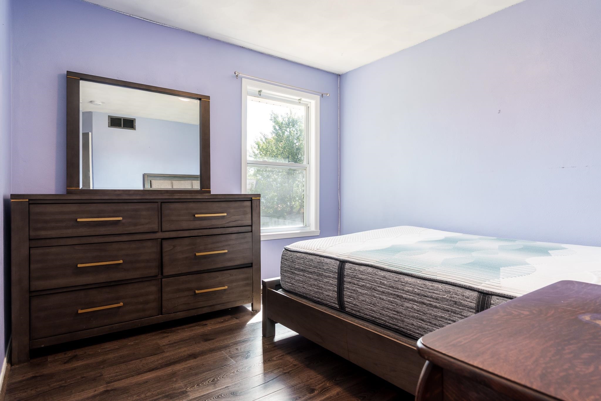 1996 Broadmoor Road Rockton, IL 61072 - Photo 32 of 45 a bed room with a bed and a dresser