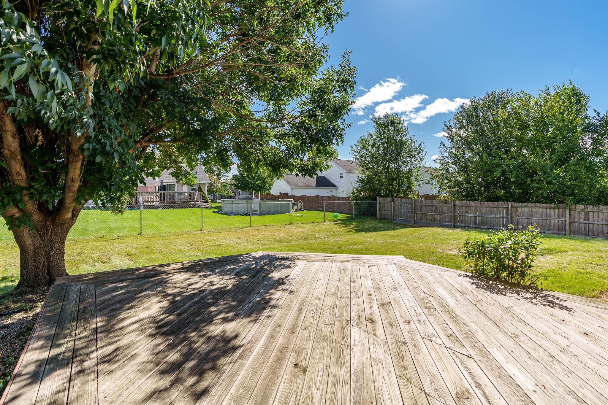 1996 Broadmoor Road Rockton, IL 61072 - Photo 10 of 45 a view of a swimming pool with a yard