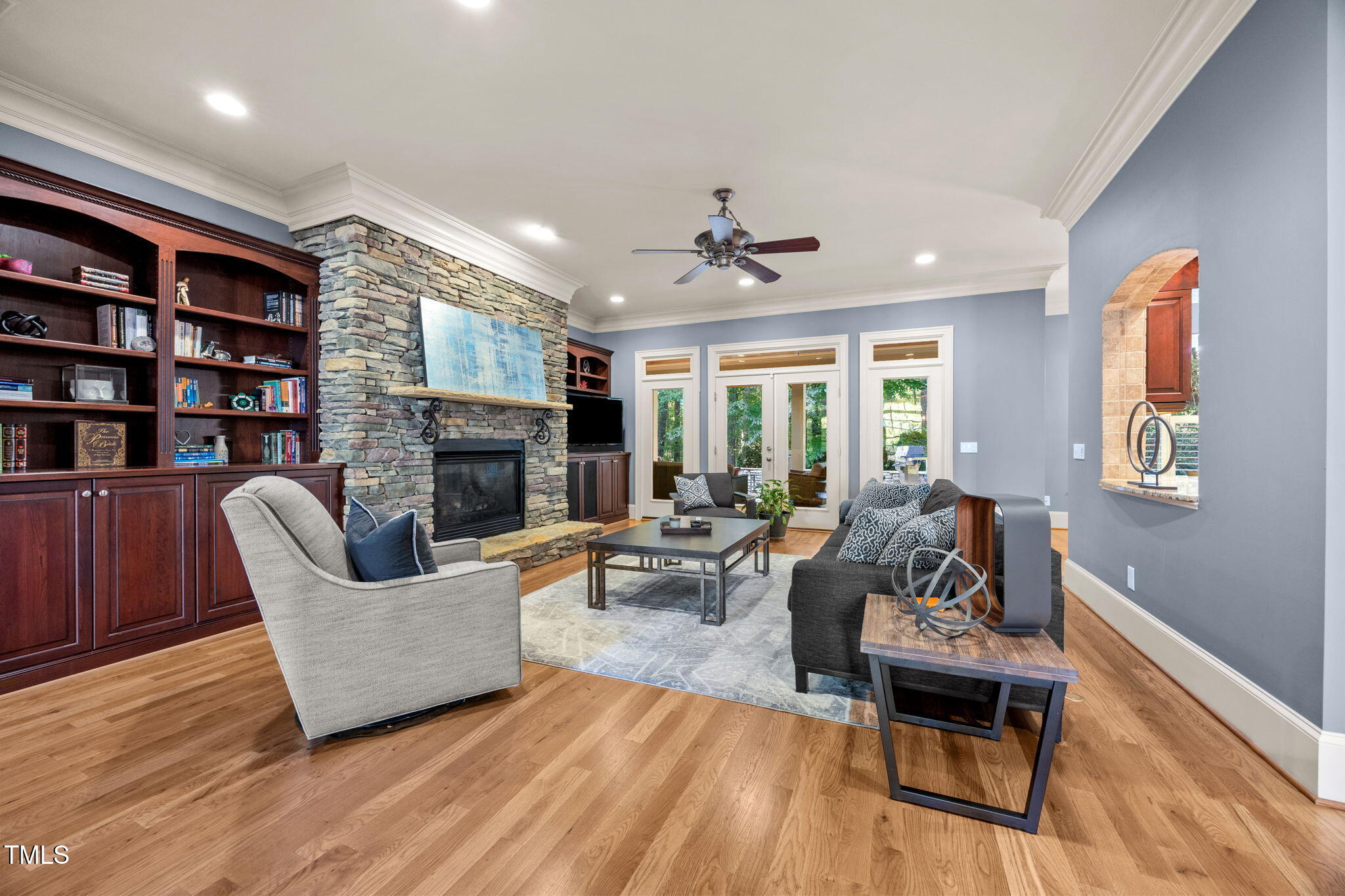 2409 Loring Court Raleigh, NC 27613 - Photo 2 of 60 a living room with furniture and a fireplace