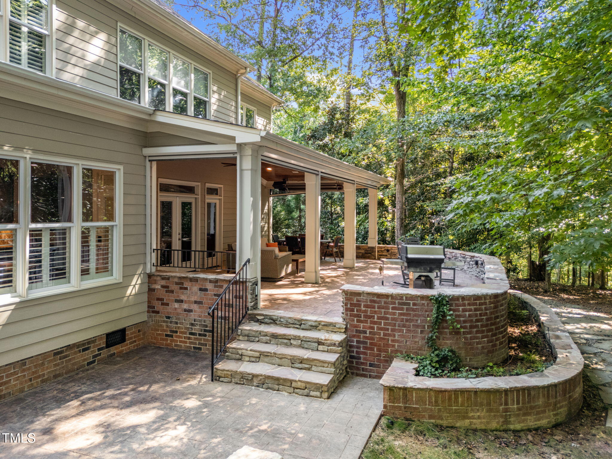 2409 Loring Court Raleigh, NC 27613 - Photo 45 of 60 a view of a house with a porch and furniture