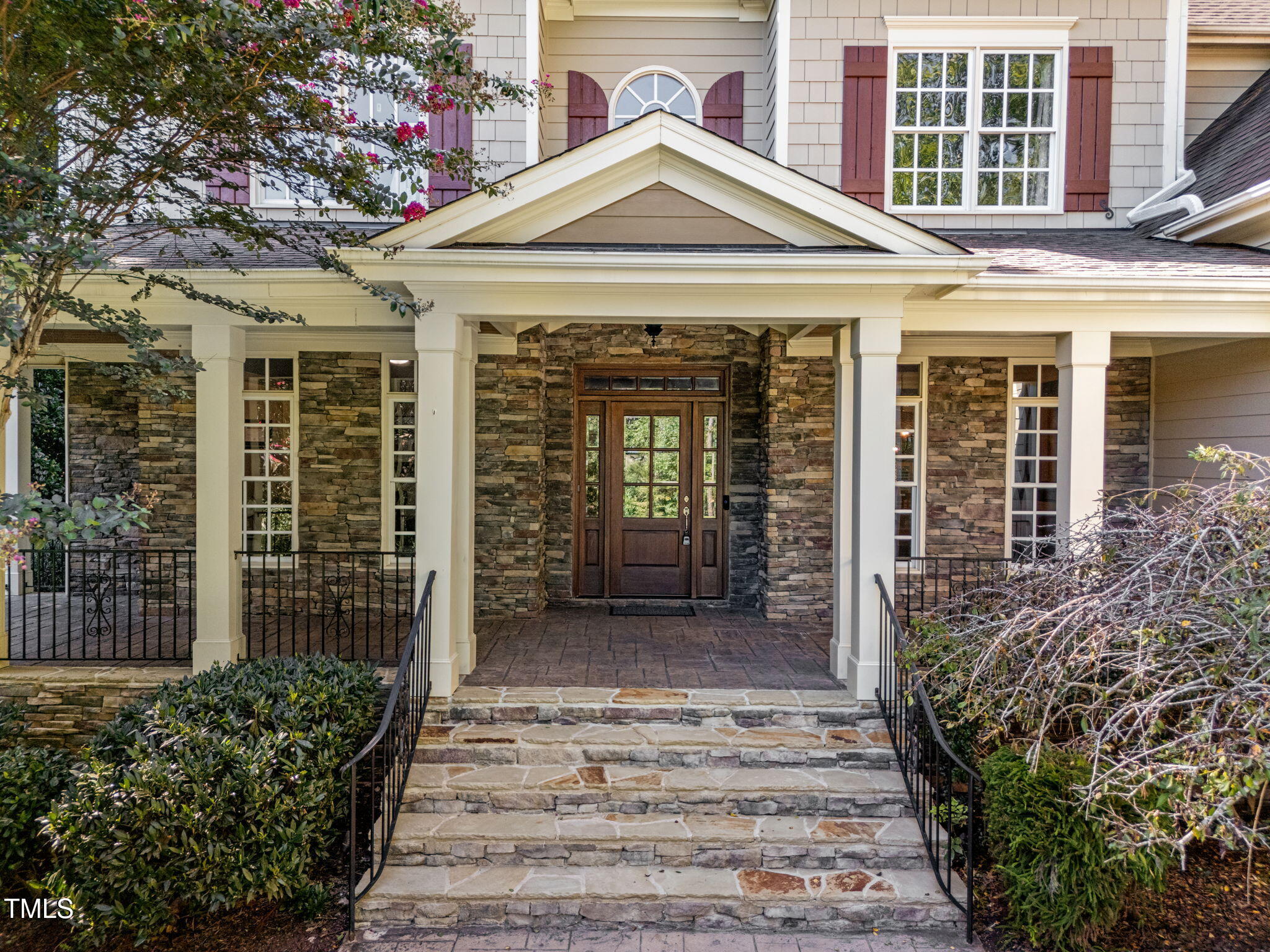 2409 Loring Court Raleigh, NC 27613 - Photo 49 of 60 a front view of a house with a porch