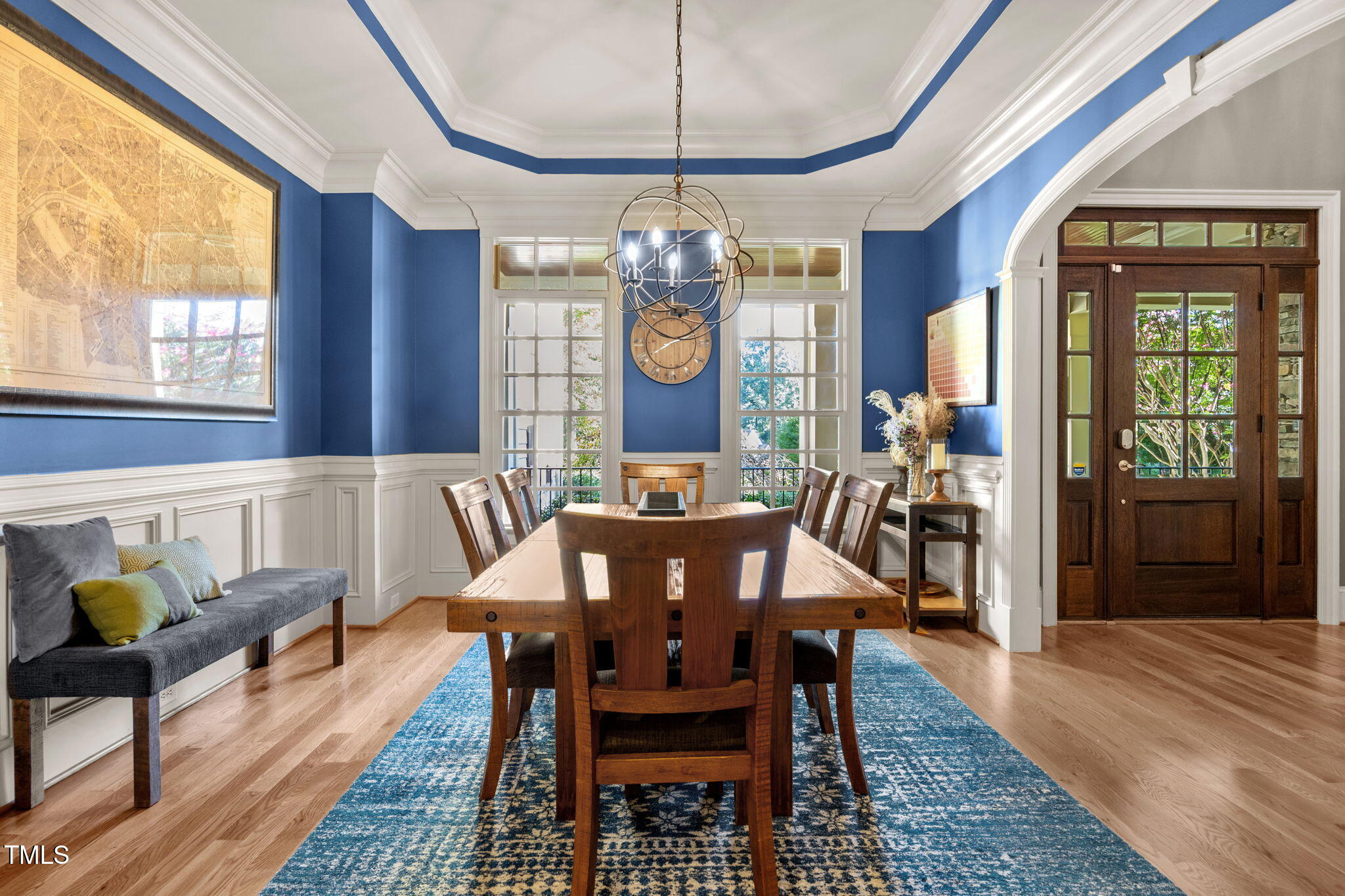 2409 Loring Court Raleigh, NC 27613 - Photo 5 of 60 a view of a dining room with furniture window and wooden floor