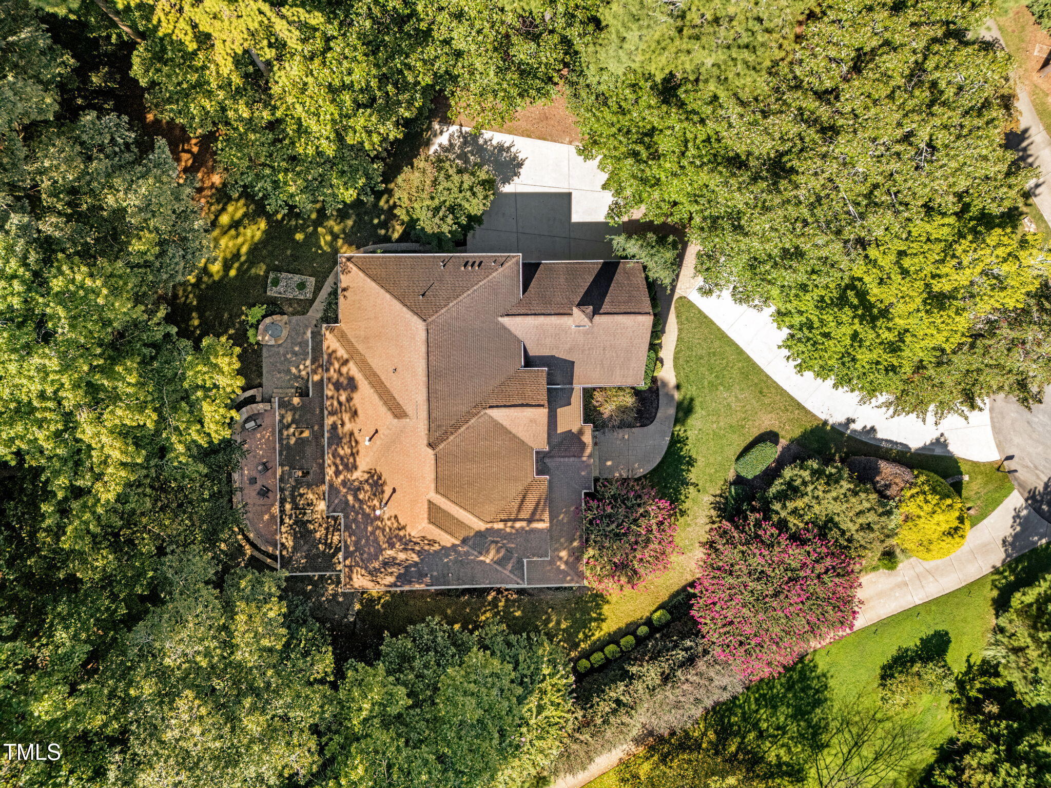 2409 Loring Court Raleigh, NC 27613 - Photo 56 of 60 an aerial view of a house with a yard and large trees
