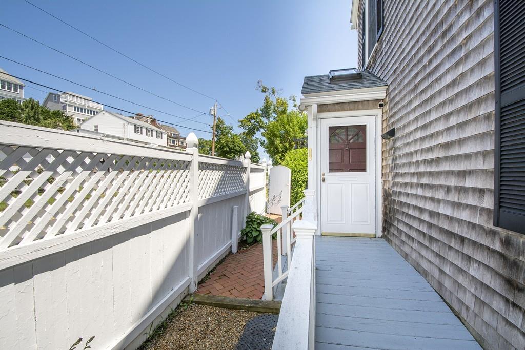 185 Downer Avenue Hingham, MA 02043 - Photo 11 of 30 a view of a balcony with wooden floor
