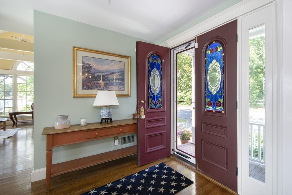 185 Downer Avenue Hingham, MA 02043 - Photo 20 of 30 a bedroom with a bed and a window