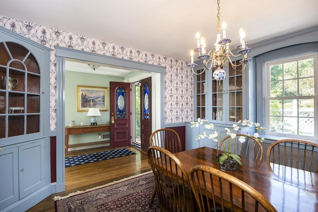 185 Downer Avenue Hingham, MA 02043 - Photo 24 of 30 a view of a dining room with furniture window and outside view