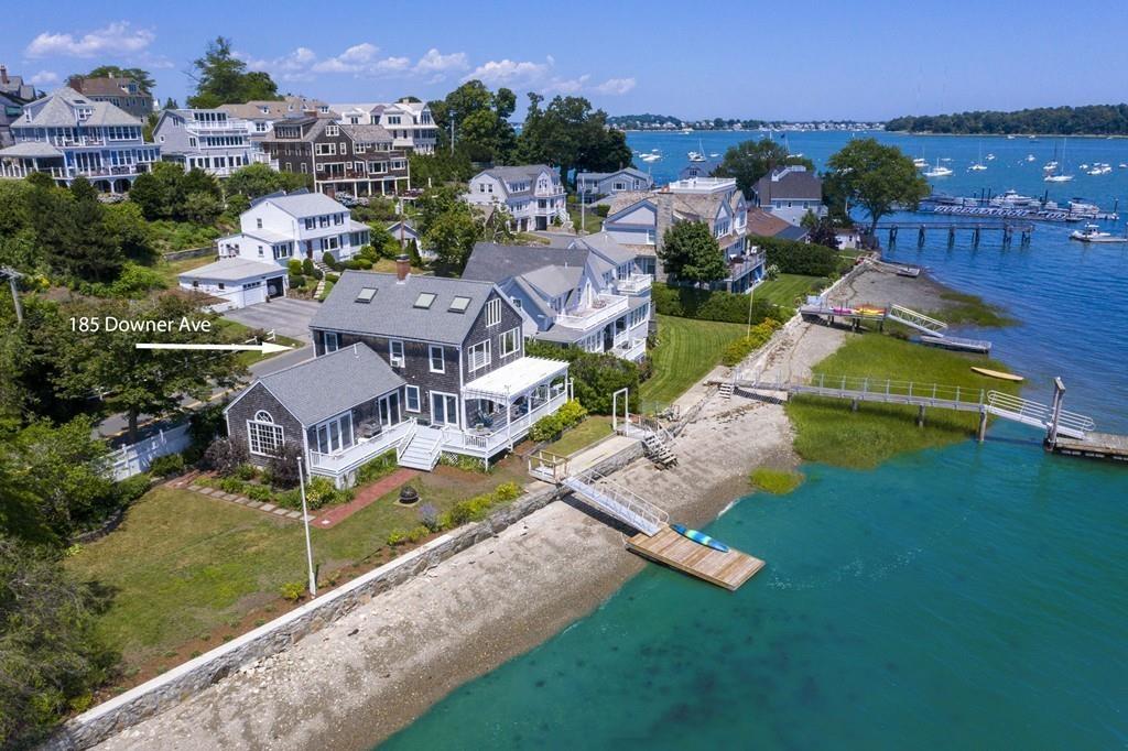 185 Downer Avenue Hingham, MA 02043 - Photo 6 of 30 an aerial view of a house with a garden and lake view