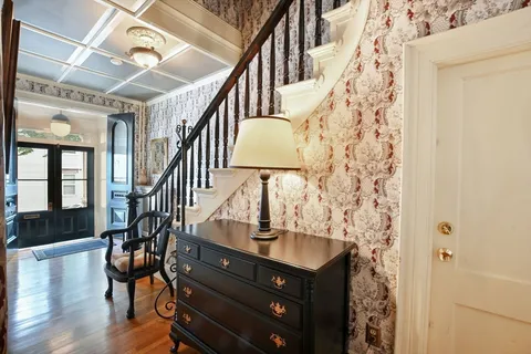a livingroom with furniture and a fireplace