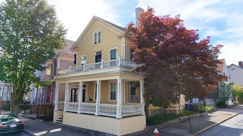 an aerial view of a city with lots of residential buildings