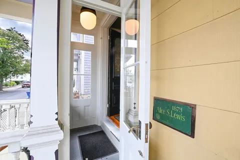 a view of a door and chair