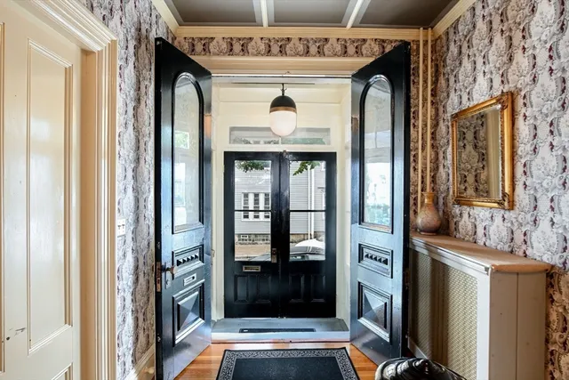 a front view of a house with a porch