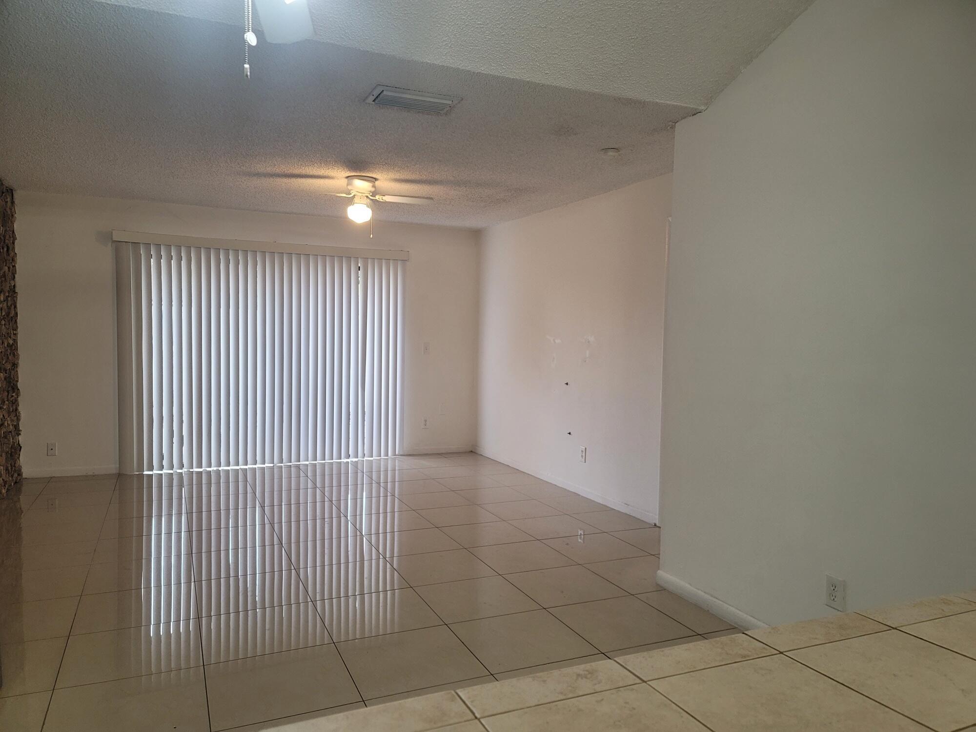 4049 Southwest 68th Way, Unit 6I Miramar, FL 33023 - Photo 15 of 32 a view of an empty room
